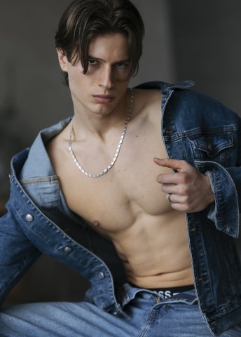 Adam A.